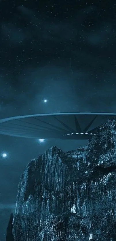 UFO hovers over mountains under a starry night sky.