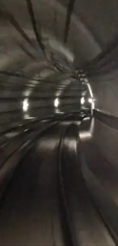 A dark and mysterious underground tunnel with curves and dim lights.