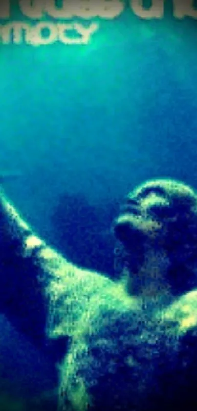 Mystical underwater statue with blue-green hues under the sea.