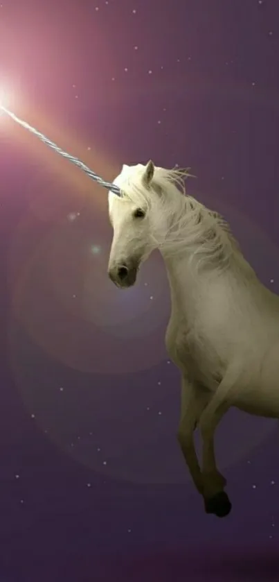 Mystical unicorn with a glowing horn against a starry purple sky.