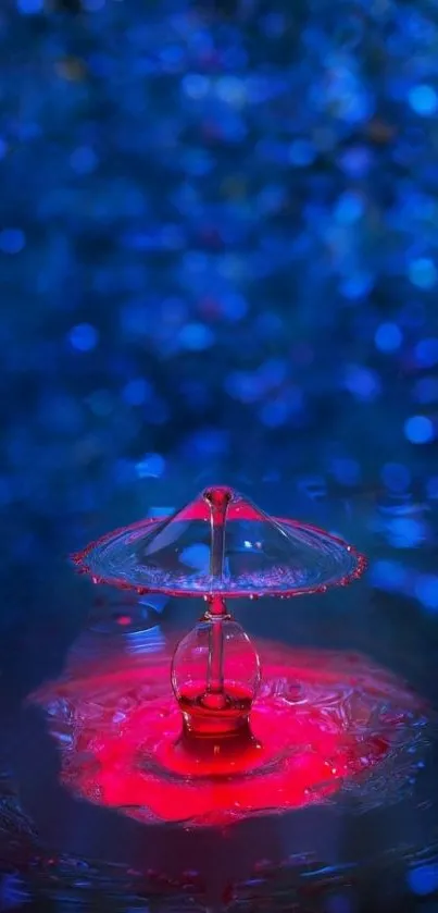 Mystical red water drop with blue bokeh background.