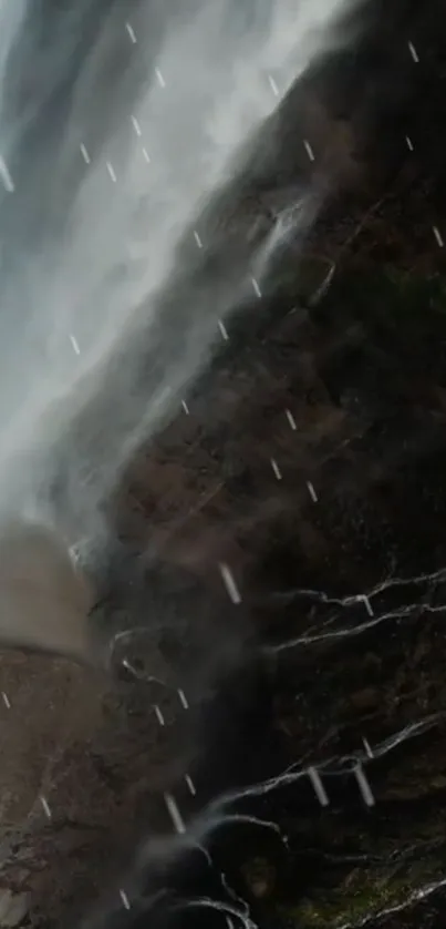 Mystical waterfall cascading over dark rocks.