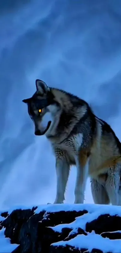 A lone wolf stands on a snowy mountain under glowing moonlight.