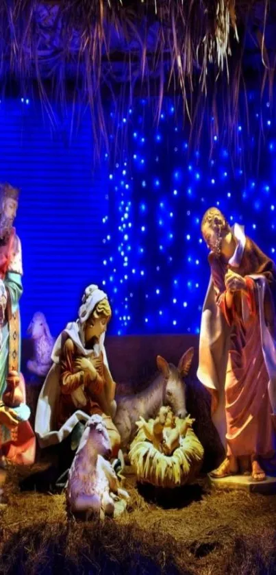 Nativity scene with vibrant blue lights and detailed figurines.