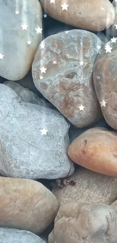 Close-up of natural pebbles with earthy tones and textures for a calm wallpaper design.