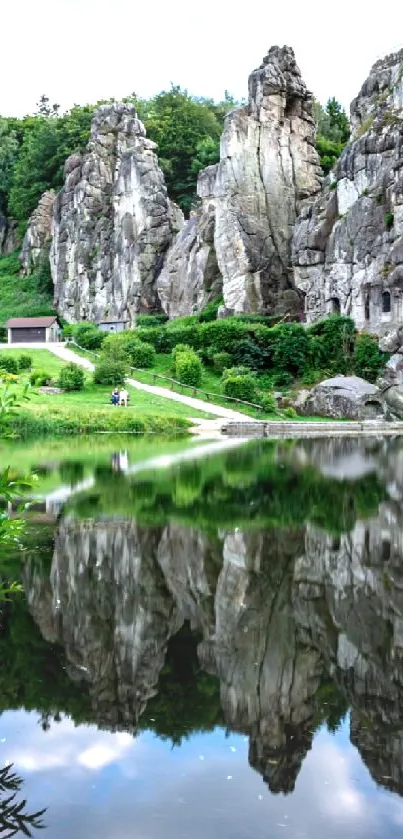 High rocks and serene lake landscape wallpaper