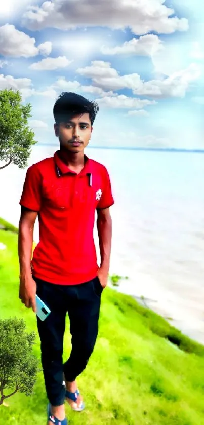 Person in a red shirt by a lake under a cloudy sky with greenery.