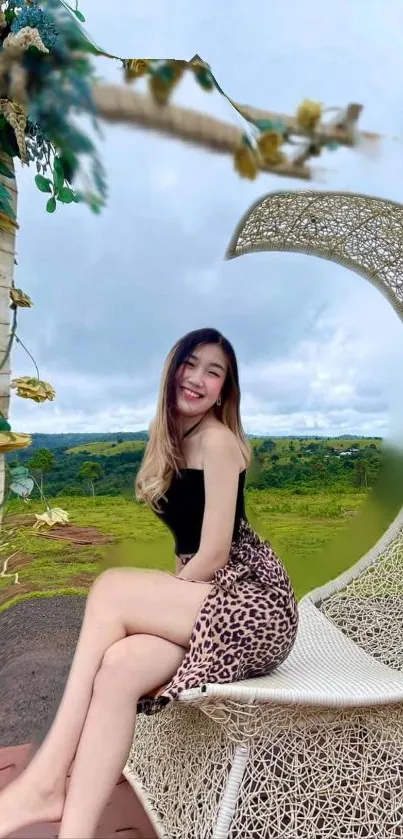 Woman smiling on chair in outdoor nature scene.