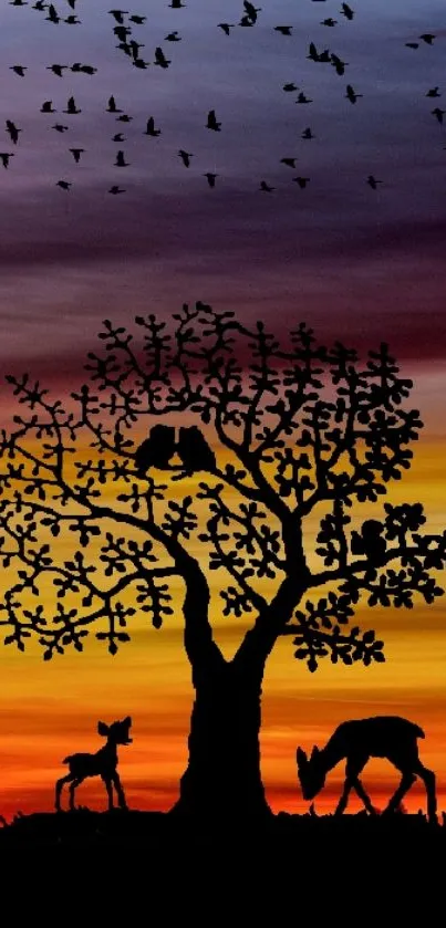 Nature silhouette with deer and birds at sunset.