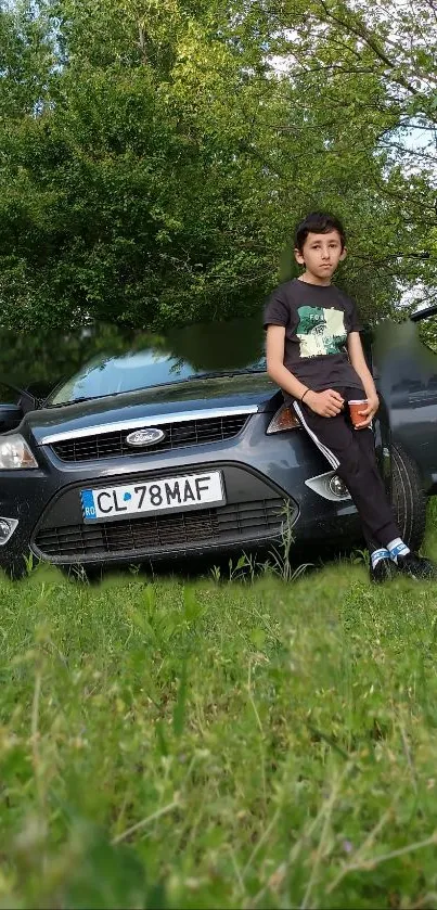 Car parked in lush green setting next to a young person.