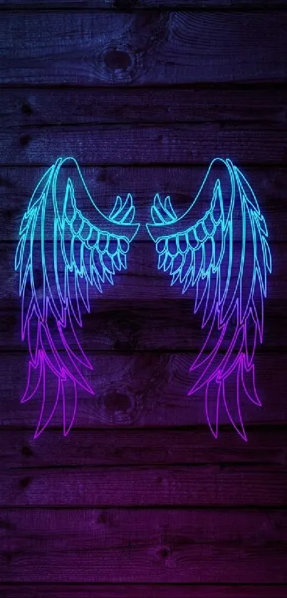 Vibrant neon angel wings on wood background.