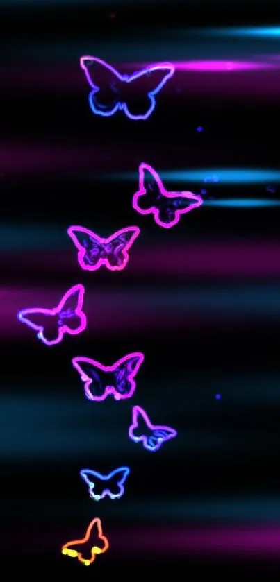 Neon butterflies glowing against a black backdrop.