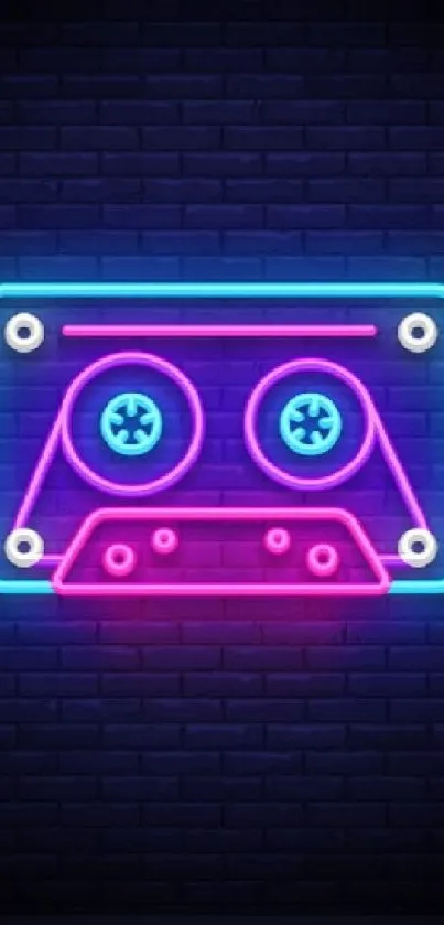 Vibrant neon cassette tape on dark brick wall.