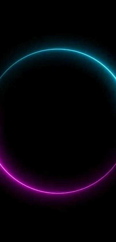 Glowing neon circle on dark black background.