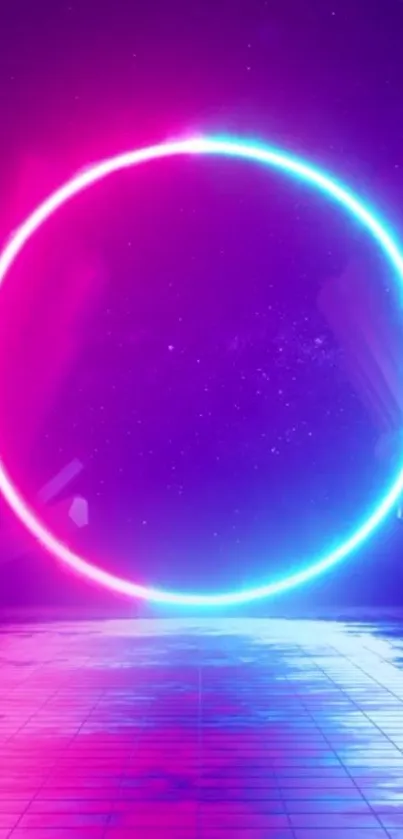 Vibrant neon circle on reflective floor with pink and blue hues.