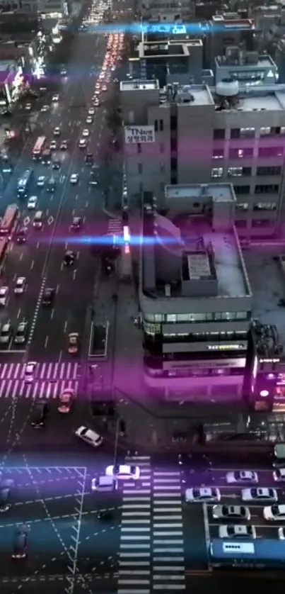 Aerial view of neon-lit city street at night with traffic.