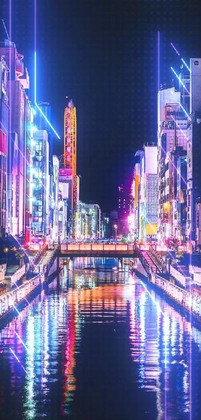 Neon-lit cityscape at night with colorful reflections on water.