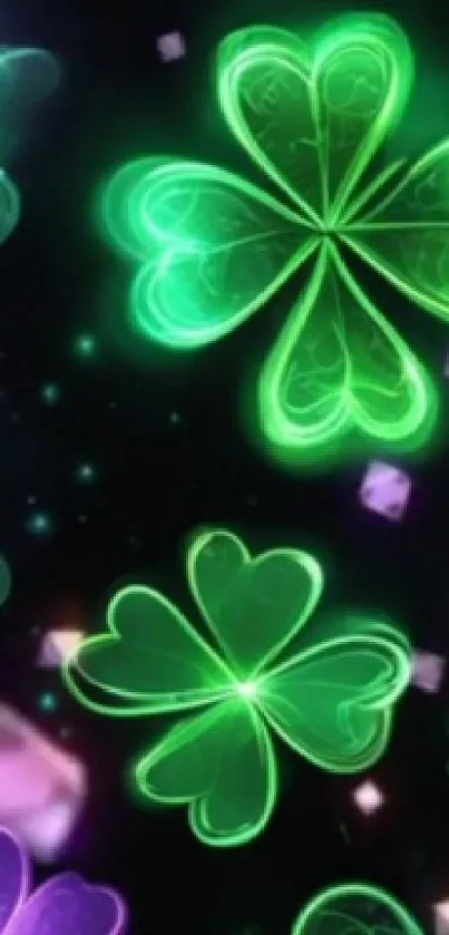 Neon clovers glowing in green on a dark background for phone wallpaper.