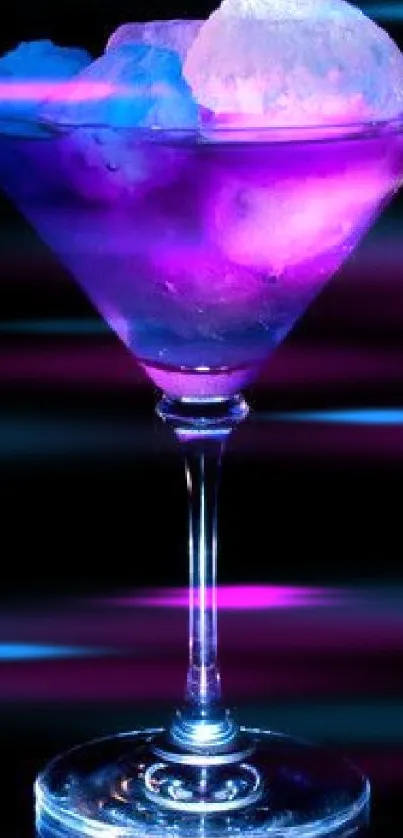 A neon cocktail glass with glowing ice cubes on a dark background.