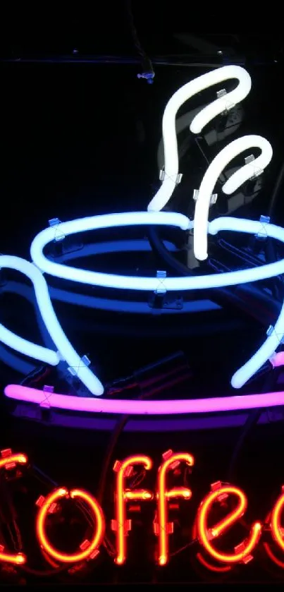 Vibrant neon coffee cup sign with colorful lights on black background.