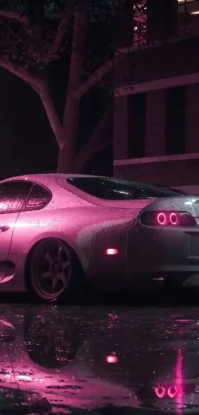 Neon-lit sports car in nighttime cityscape.