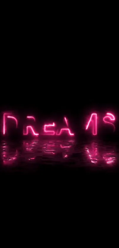 Neon pink 'Dreams' text on a black background with reflection.