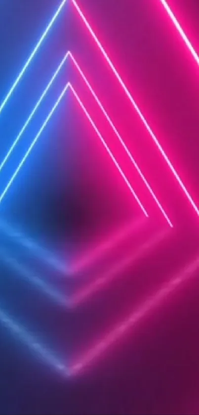 Neon pink and blue geometric wallpaper with triangles.