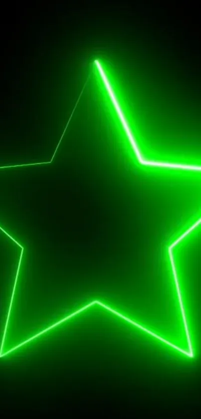 Neon green star glowing on dark background.