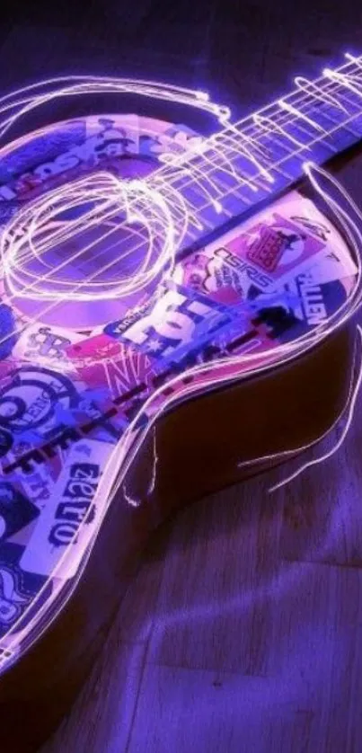 Neon glowing guitar with colorful graphics and purple lighting.