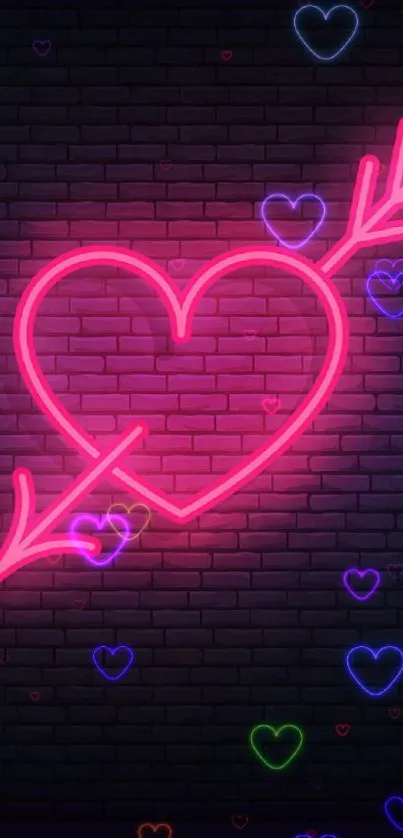 Neon heart and arrow on dark brick background wallpaper.