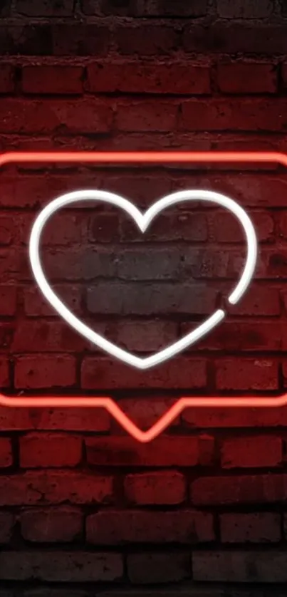 Red neon heart on a brick wall background.