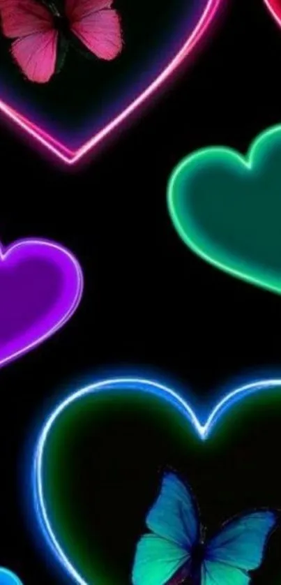 Neon hearts and butterflies in vibrant colors on black background.