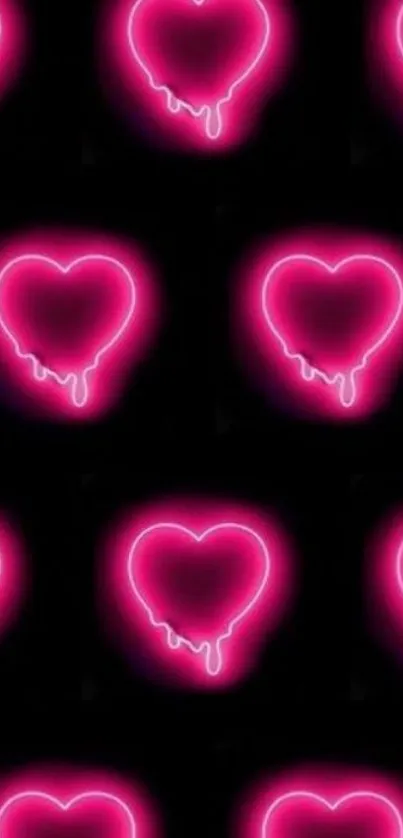 Neon pink heart drip wallpaper with dark background.