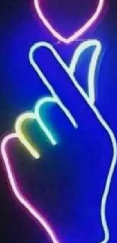 Neon hand gesture with heart design on blue background.