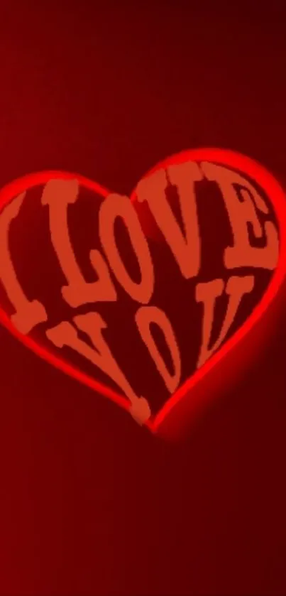 Glowing red neon heart with 'I Love You' text on dark background.