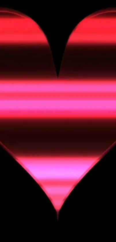 Neon heart with red and magenta glow on black background.