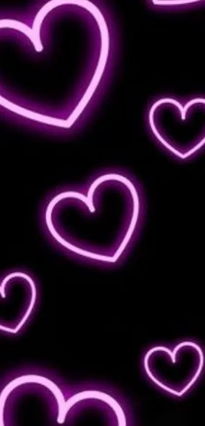 Purple neon hearts on black background mobile wallpaper.