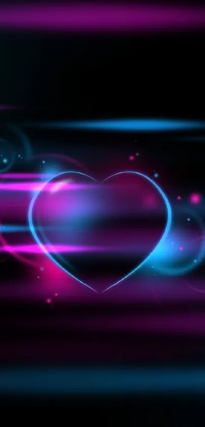 Neon heart design with dark background.