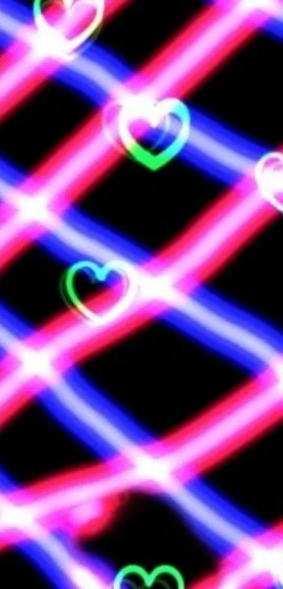 Neon heart pattern on black background wallpaper.