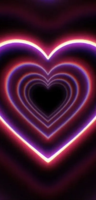 Neon heart wallpaper with layers of pink and purple glow.