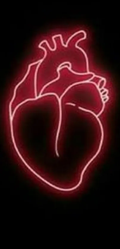 Neon red heart glowing on a dark background.