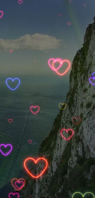 Colorful neon hearts with ocean cliff view.