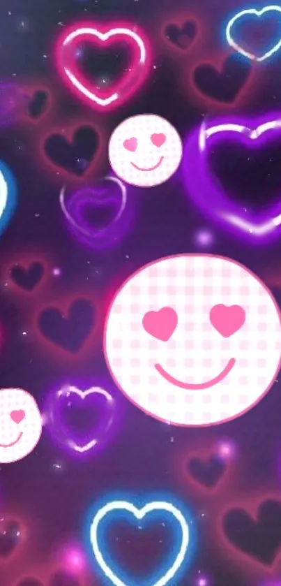 Neon heart and smiley emoticon wallpaper with vibrant colors on a dark background.