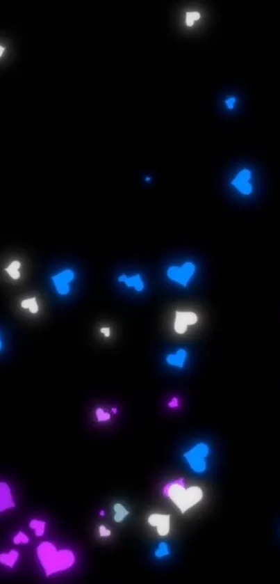 Colorful neon hearts on a black background wallpaper.