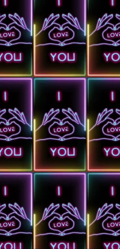 Neon artwork of hands forming a heart with text 'I Love You'.