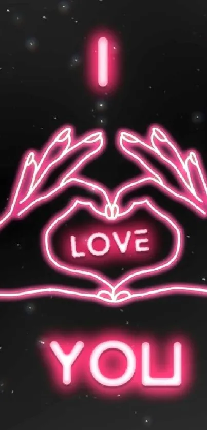 Neon pink love message wallpaper with hand heart shape.