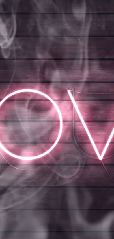 Neon pink 'Love' sign with smoky background.