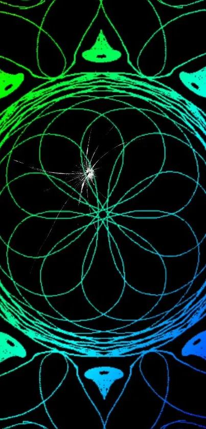 Neon mandala with green and blue hues on a black background.