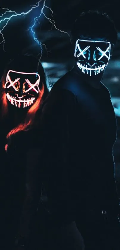 Couple wearing neon glowing masks in a dark setting.