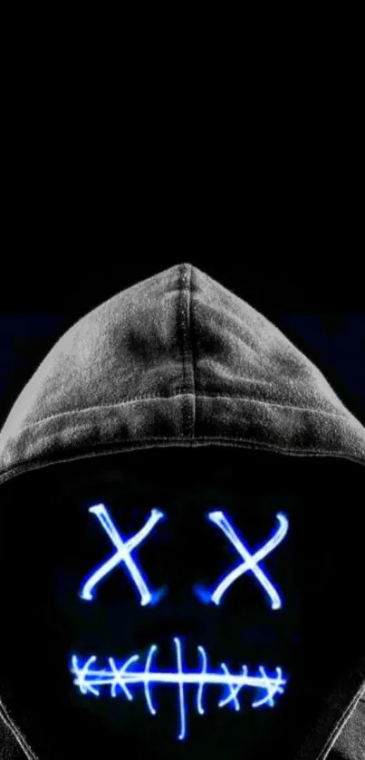 Neon mask in hood on a black background.